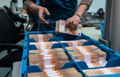 Паллет с банкнотами в отделении 1 Главного управления Центрального банка России по центральному федеральному округу.