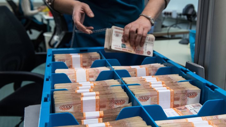 Паллет с банкнотами в отделении 1 Главного управления Центрального банка России по центральному федеральному округу. Паллет с банкнотами в отделении 1 Главного управления Центрального банка России по центральному федеральному округу.